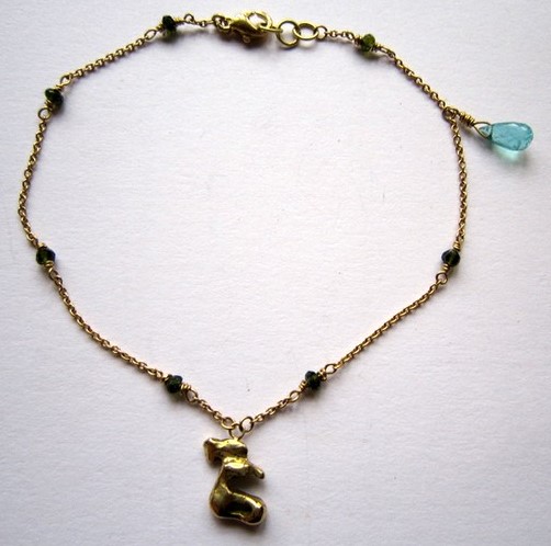 Gold 18ct
                        bracelet with a little deer pendant