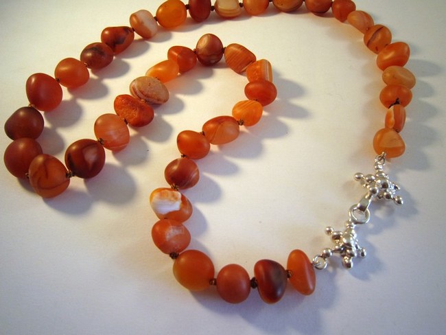 Carnelian necklace with silver
                        clasp